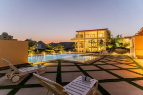 Elegant 5BHK Villa with Private Pool By Ozy Stays